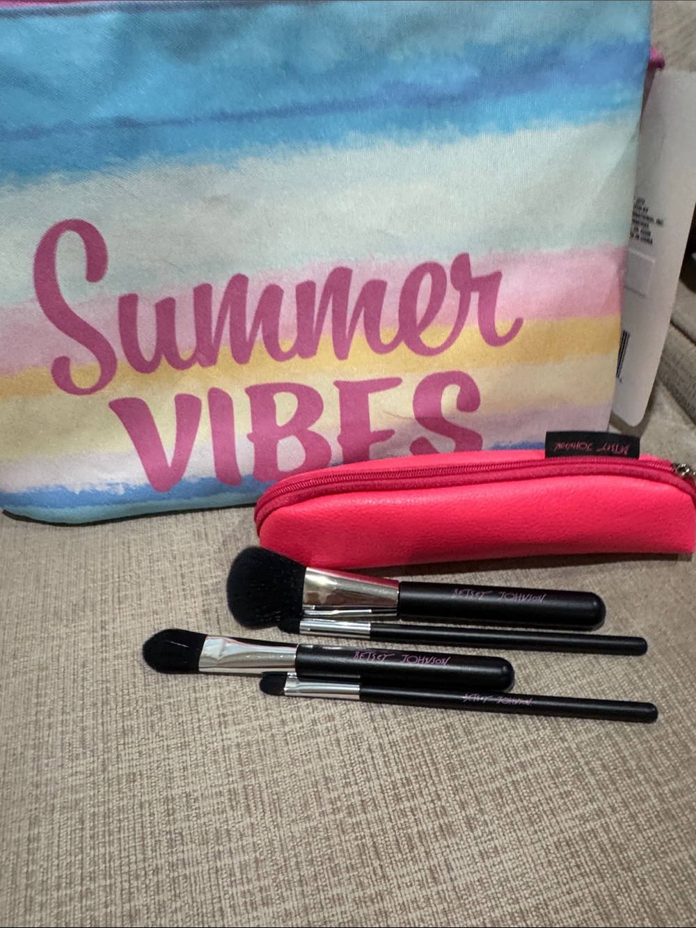 Betsy Johnson makeup brushes
Set with pouch, and summer vibes pouch